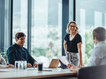 Business people having casual discussion during meeting