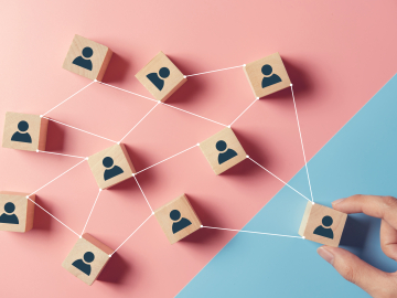 Image for DIPVAR project team: connected wooden cubes that represent team members