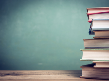DIPVAR Publications image: Books on a table