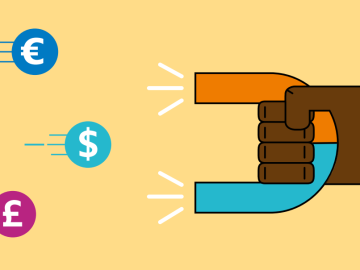 magnet pulling currency signs