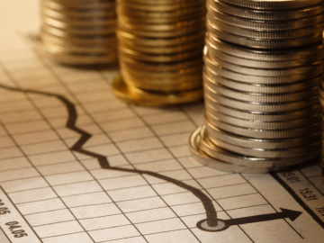 stack of money and chart 
