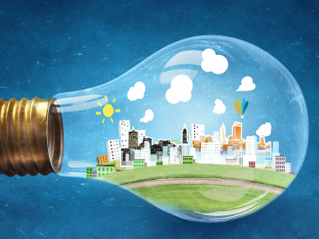 light bulb with city inside