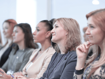 Women listening to panel discussion