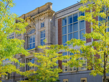 Facade of ESMT in summer