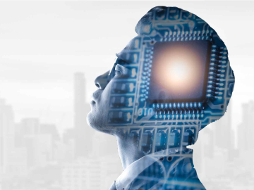 AI concept of person in silhouette overlayed with electric circuit