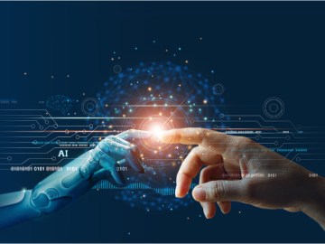 A human fingertip and a machine fingertip touch each other