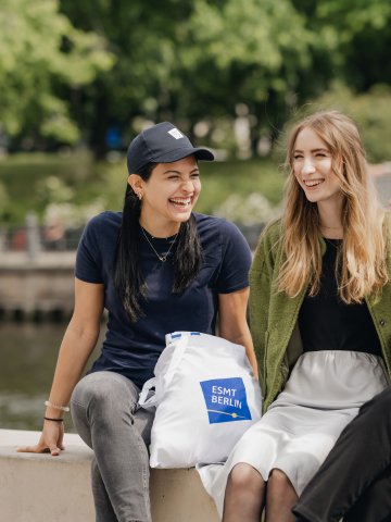 Students from ESMT Berlin enjoying a summer day by the Spree