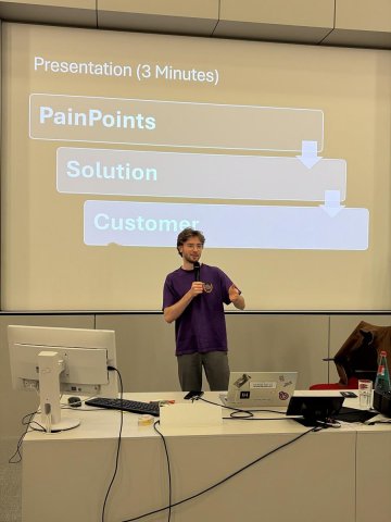 Master's student Alexander Berner presenting a topic in class at ESMT Berlin