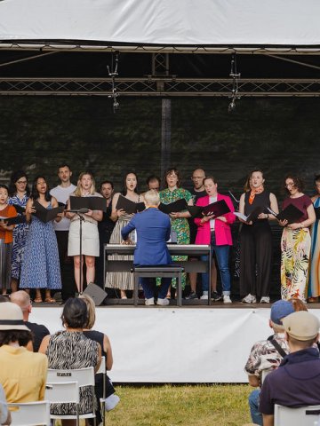 The ESMT Choir singing at the  Nachbarschaftsfest event on the school campus