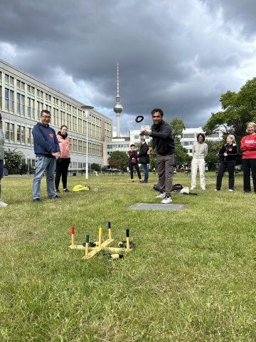 Punit Thakkar competing in the EMST Olympics in the campus garden