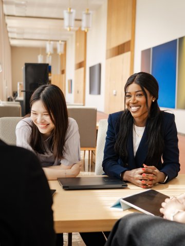 ESMT Berlin Full-time MBA student Gloria Motopu and classmates studying together on campus
