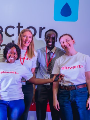 ESMT Master in Global Management alum Elise Most in Uganda with her team