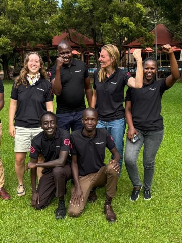 ESMT Master in Global Management alum Elise Most in Uganda with friends and colleagues  during her Responsible Leaders Fellowship