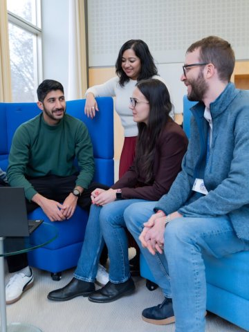 Part-time MBA students on campus  looking interested in the topic