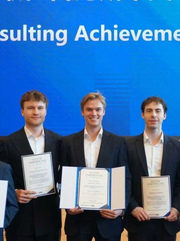 ESMT master's students with their certificates after winning a consultancy competition at ZIBS