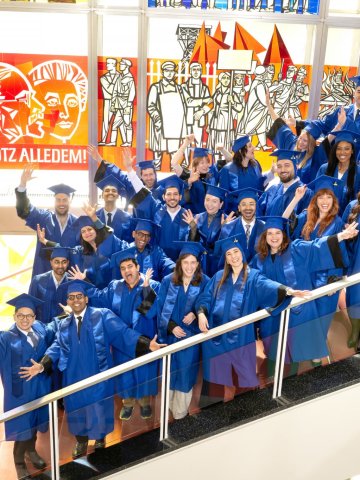 The ESMT Full-time MBA graduating class of 2026 in their blue graduation gowns