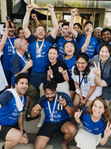 ESMT Berlin Full-time MBA students celebrating after winning medals at the ESMT Olympics