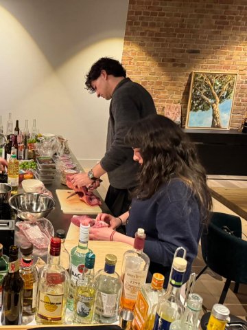 Master in Innovation and Entrepreneurship student Valentina Vergara Stange and her cohort sharing food together