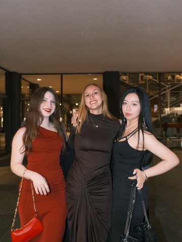 ESMT Master in Analytics and AI student Victoria Landazuri and friends from her degree program at a formal evening