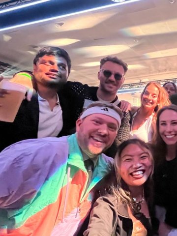 ESMT Berlin Full-time MBA student Scott Davis and his cohort celebrating at party