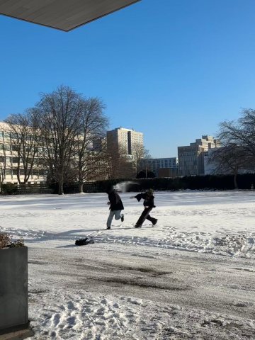 ESMT Berlin Master in Innovation and Entrepreneurship student Valentina Vergara Stange and friends having a snowball fight in the ESMT garden