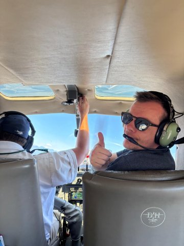 ESMT Berlin Part-time MBA student Tim Krewerth flying a plane