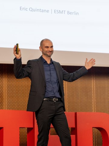 ESMT professor Eric Quintane giving a specch during the TEDxESMT Berlin event in 2025