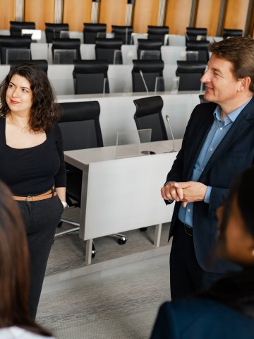 ESMT Berlin Full-time MBA alum Anahita Moaddab and other students with ESMT president Jörg Rocholl at an event on campus