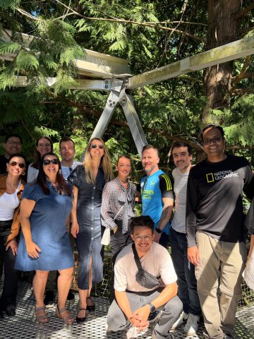 ESMT Berlin Part-time MBA student Tim Krewerth and peers in the forest on an outdoor education unit