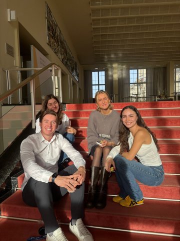 ESMT Berlin Master in Global Management student Johanna Schulze Thier and friends sitting on the stairs on campus