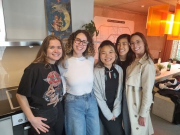 ESMT Berlin Full-time MBA student Beatriz Sgobi and her women classmates at a dinner together