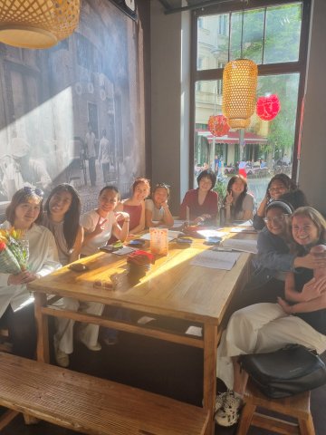 ESMT Berlin Full-time MBA student Beatriz Sgobi and her female classmates at a dinner together