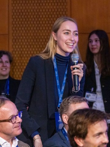 ESMT Berlin Master in Global Management student Sophie von Rohr asking a question at Berlin Global Dialogue