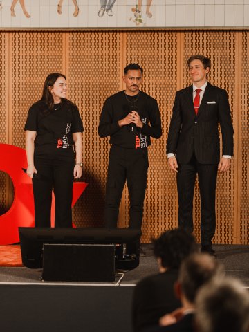 ESMT Berlin student organizers on stage at the TEDxESMT Berlin event
