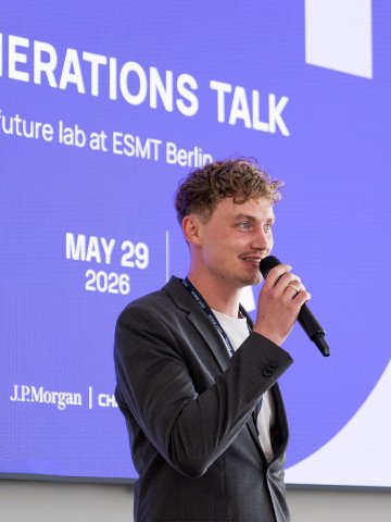 ESMT Berlin Master in Global Management student Lucas Wall on stage at the Generations Talk event