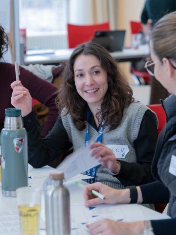 The ESMT Berlin Part-time MBA students networking during an in-person residency on the ESMT campus