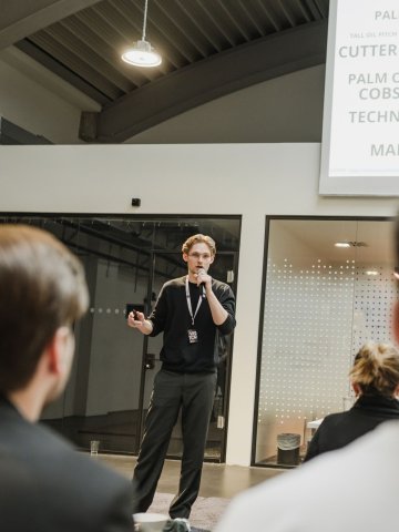 Students giving a speech on stage during the Bootcamp at EMST Berlin