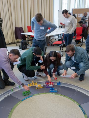 ESMT Berlin Part-time MBA students in a residency, doing a hands-on exercise