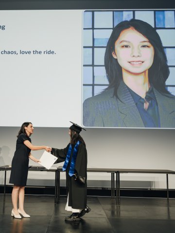 Portrait of ESMT Master in Innovation and Entrepreneurship student Yuxin Huang during her graduation ceremony