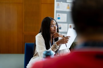 ESMT Berlin Global Online MBA student Joan Mwaniki in a lecture on campus during Berlin Experience Week