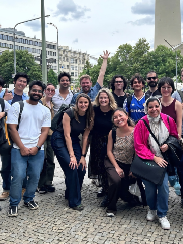 ESMT Berlin Full-time MBA students and Career support staff talking a group selfie while out in Berlin for a company visit