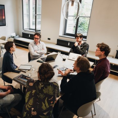 Small-group discussion during a DEEP Academy workshop