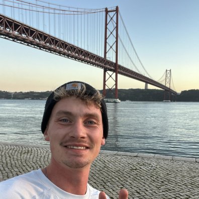 Lucas at the Ponte 25 de Abril Bridge in Lisbon Portugal