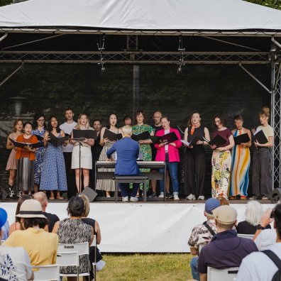 The ESMT Choir singing at the Nachbarschaftsfest event on the school campus