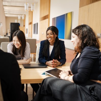 ESMT Berlin Full-time MBA student Gloria Motopu and classmates studying together on campus