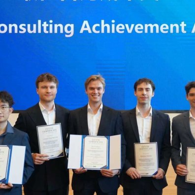 ESMT master's students with their certificates after winning a consultancy competition at ZIBS