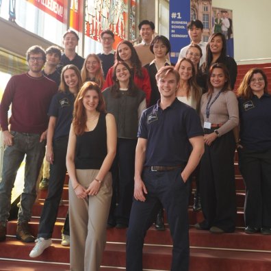 ESMT Consultancy Club posing on the staircase at ESMT as a group