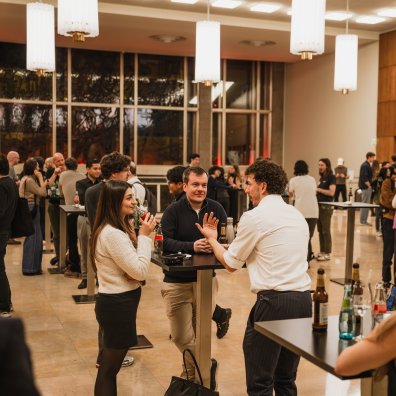 Students from MBA and master's cohorts connecting during TEDxESMT Berlin