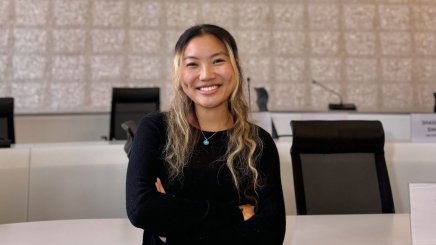 ESMT Berlin Full-time MBA student Ting Han in a lecture hall on campus
