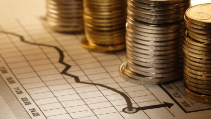 stack of money and chart 